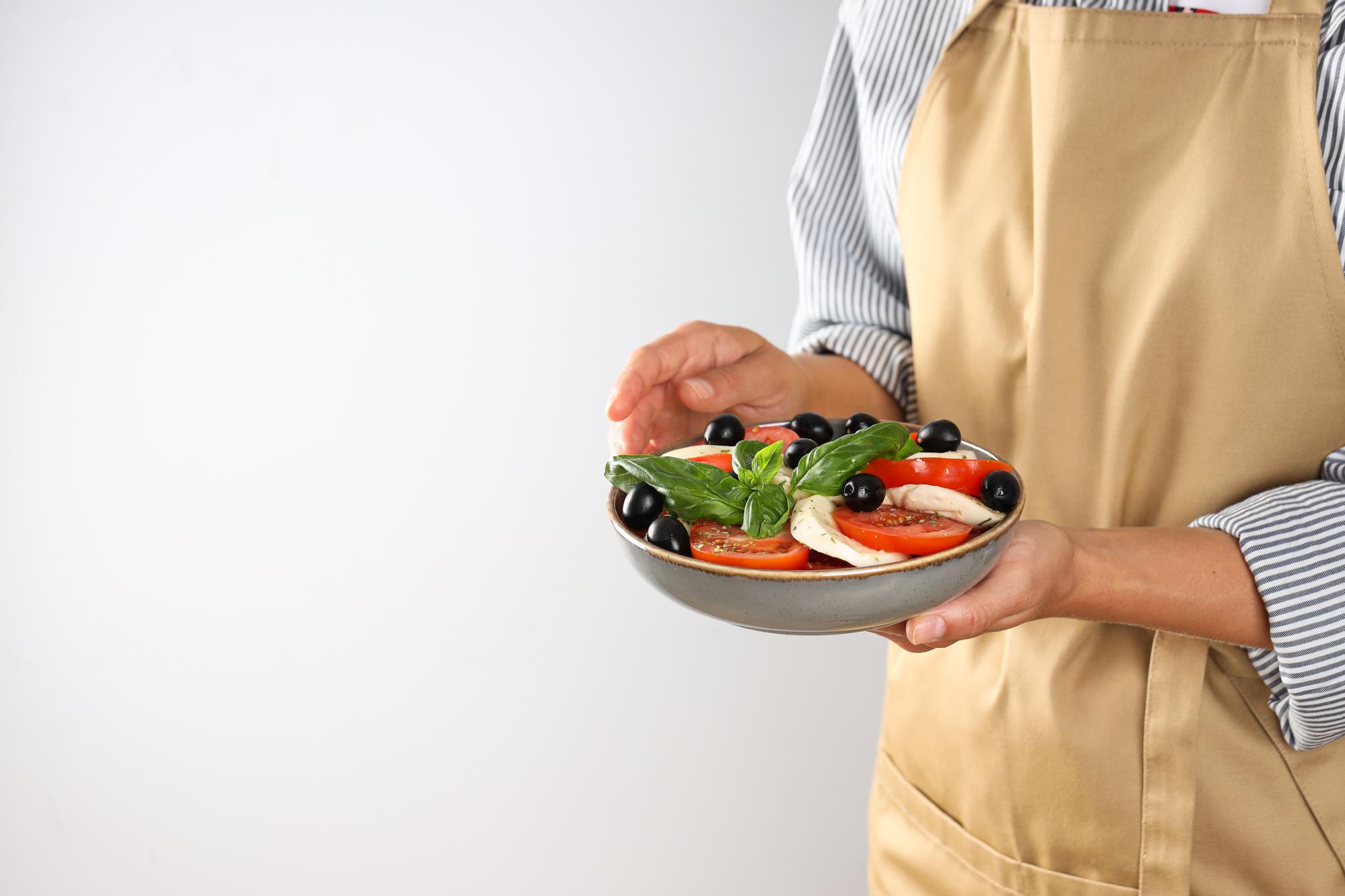 Chef preparing a quick home meal in bright kitchen